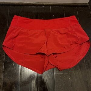 Red lululemon speed up size 4 shorts. 2.5 inseam